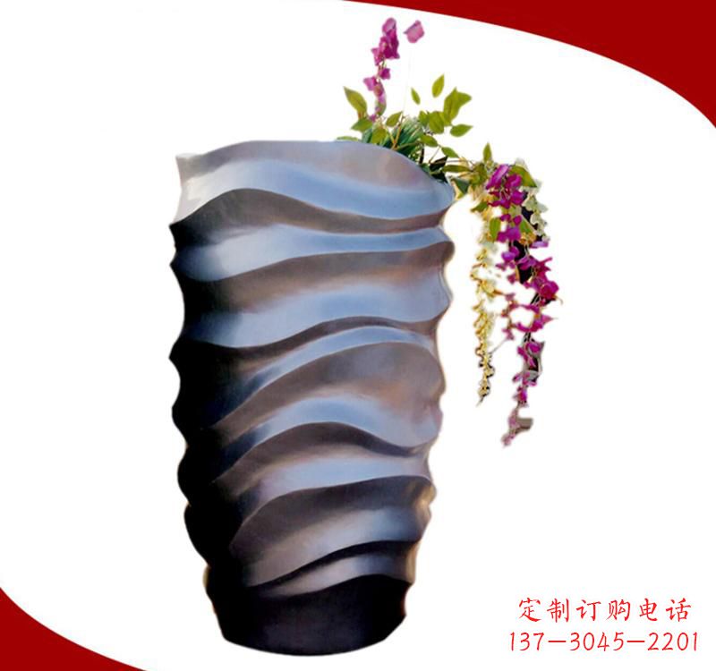 达州不锈钢校园景观花盆雕塑