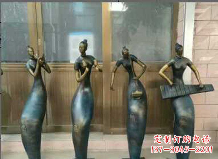 达州抽象女孩演奏乐器铜雕
