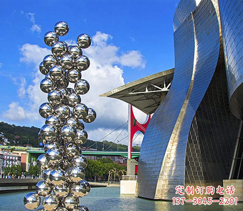 达州高端不锈钢抽象龙柱雕塑