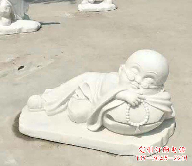 达州汉白玉摆姿势的小和尚雕塑