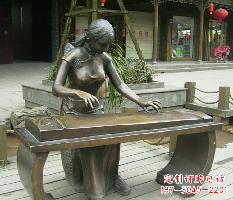 达州铜雕现代人物弹古筝雕塑